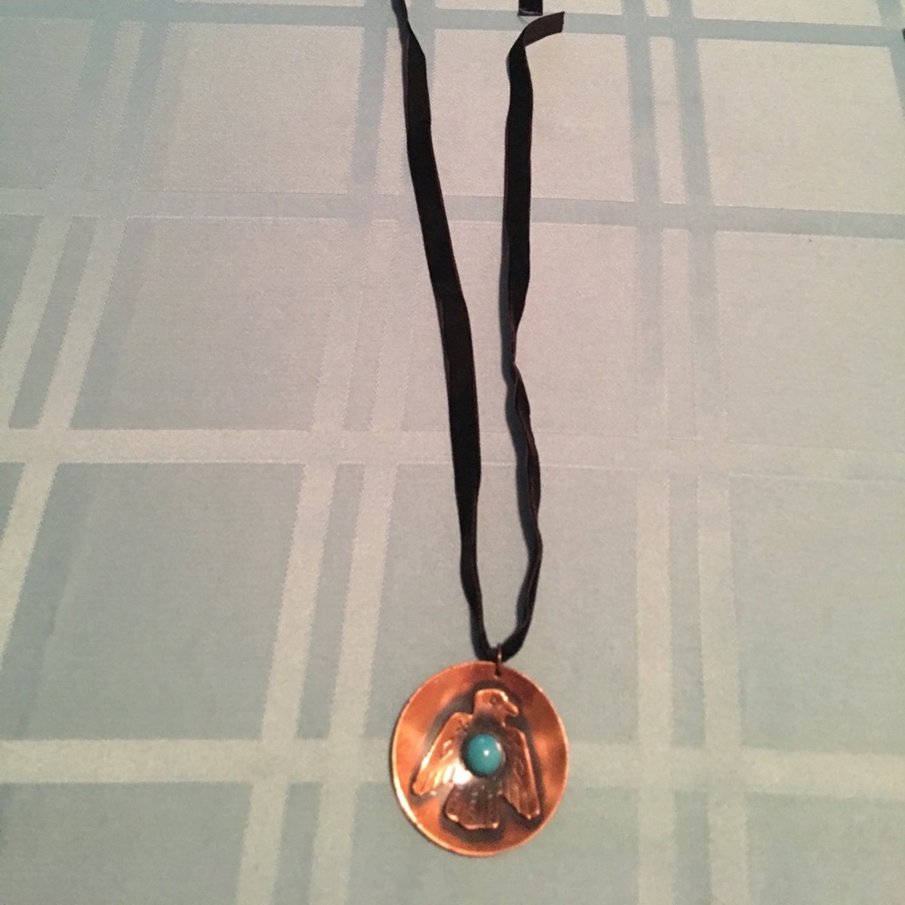 A Genuine Copper Eagle with Blueish stone Pennant